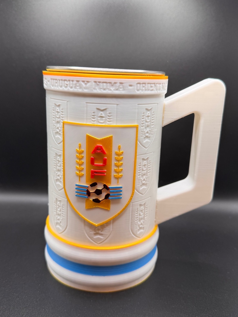 White Decorative Sports Crest Beer Stein with Yellow & Blue Accents